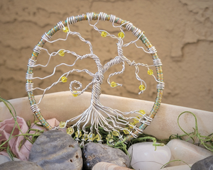 front view yellow glass bead tree of life wall hanging makes for a great windowsill display